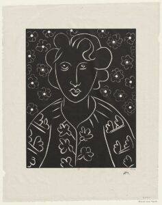 マティス《Isaïa（イザイア）》1938年、黒地に白線で描いた花柄の衣装の女性肖像。リノカット版画