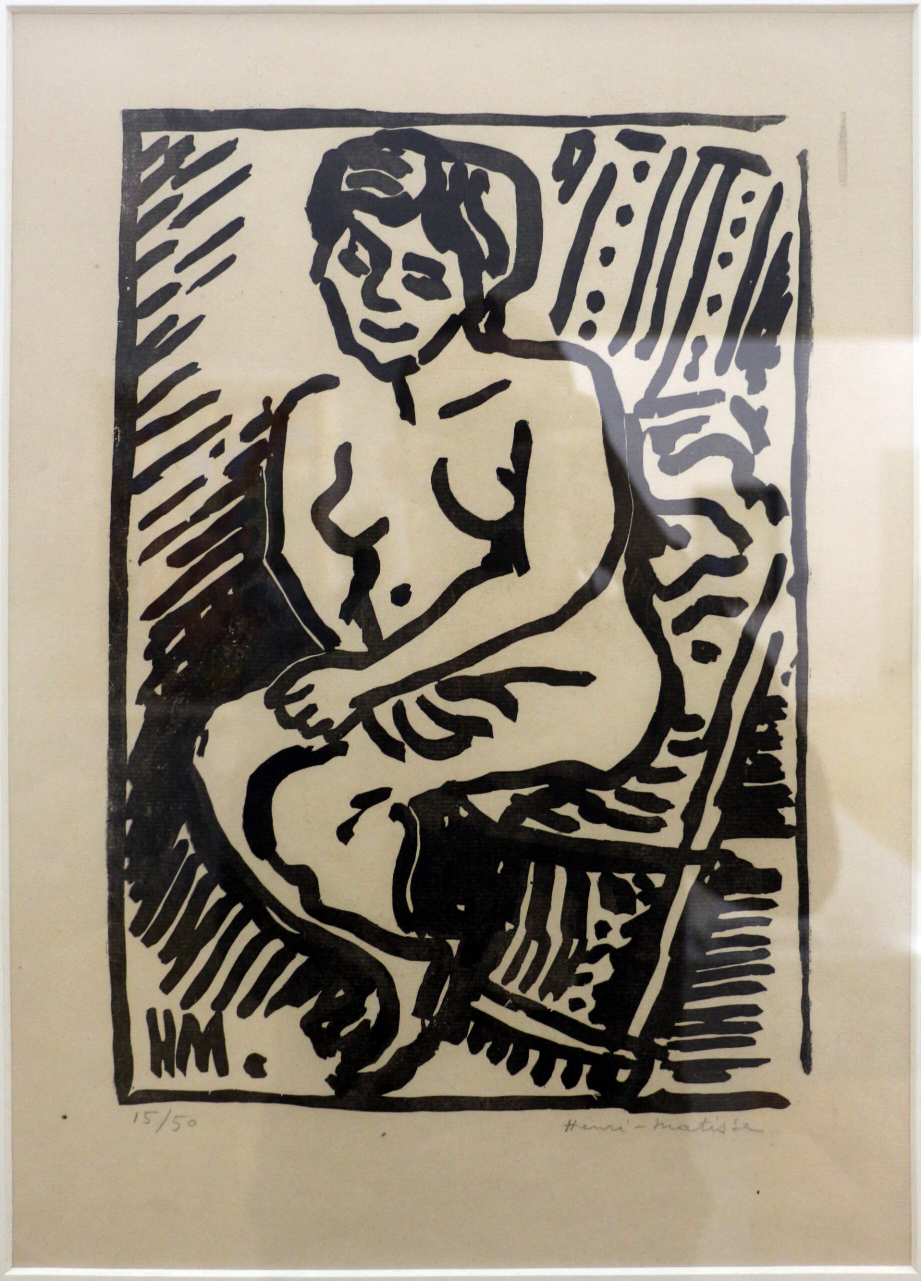 アンリ・マティスの木版画《小さな黒い木版画》1906年。黒い線と斜線が人物を取り囲む
